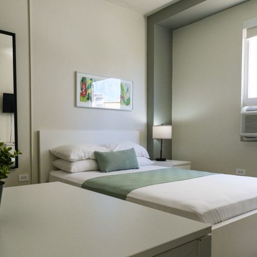 Every detail is designed for your comfort. This inviting bedroom offers a tranquil retreat, perfect for unwinding and preparing for new adventures.
