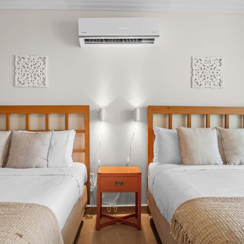 Experience serene mornings with abundant natural light and the gentle breeze from your private balcony overlooking the lagoon.