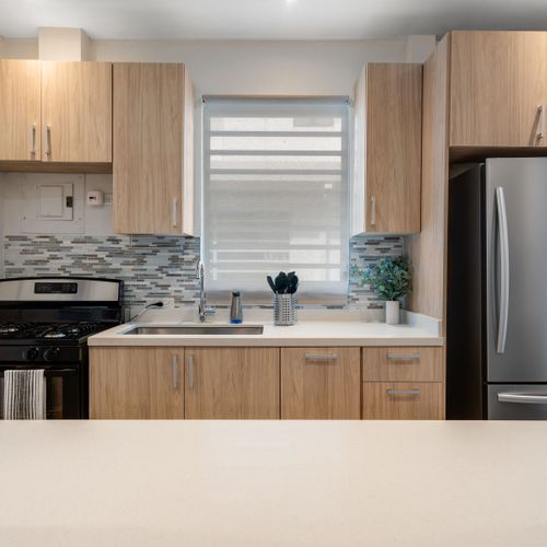 A well-equipped kitchen with brand-new appliances.