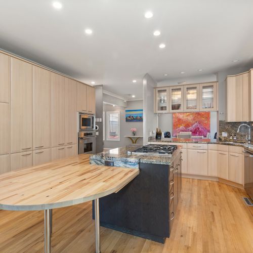 Prepare meals with ease—everything you need in a sleek, modern space.
