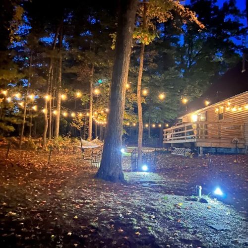 Exterior:  another shot of the backyard at night.