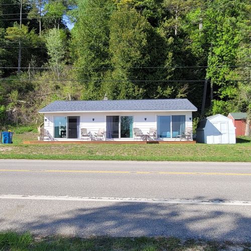 Exterior:  looking at the cottage from the private beach.