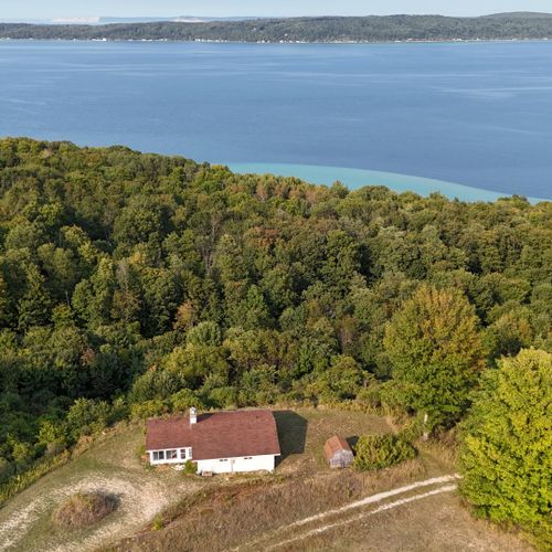 Overview:  another view of crystal lake with view of sleeping bear sand dunes and lake michigan in the distance