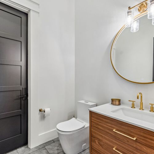 Well appointed bathroom with sleek vanity, toiletries, and spa‑like feel.