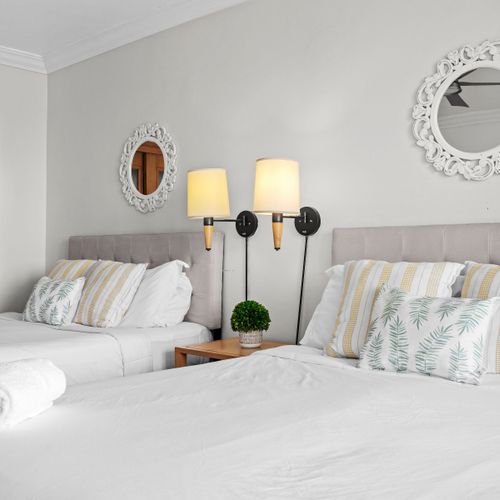 Cozy and comfortable bed, perfectly set for a restful night's sleep in a tranquil setting.