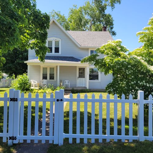 OVERVIEW:  Looking at the front of the house from the sidewalk.