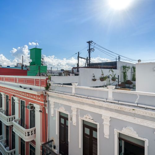 Step onto our charming balcony and behold a breathtaking panorama of the city's architectural splendor. Nestled high above, this balcony offers a front-row seat to a skyline adorned with beautiful buildings, each telling a story of the city's rich history and vibrant character.