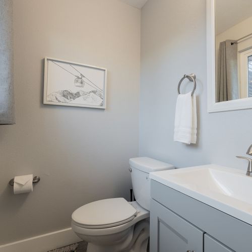 The private half bathroom offers your own private place to freshen up.