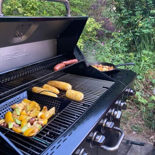 Fire up the grill and enjoy easy outdoor meals. There's plenty of space for grilling favorites like corn, veggies, and sausages—perfect for laid-back dinners after a day of exploring. Simple, relaxed, and made for gathering outdoors.