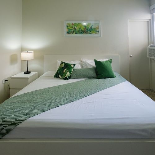 This room combines essential amenities with a comfortable sleeping area, ensuring a practical and enjoyable stay with everything you need within reach.