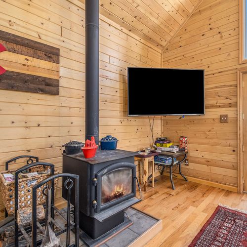 - snuggle up beside the wood burning stove for cozy nights with the fire crackling nearby