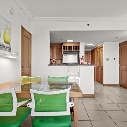 Comfortable dining area with vibrant seating, perfect for meals or catching up on work.