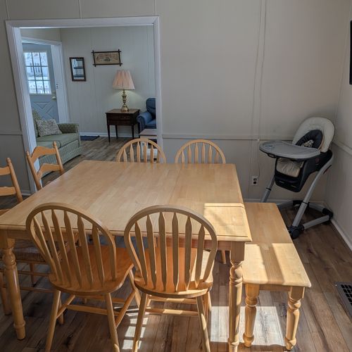 DINING ROOM:  Large family-friendly dining room with new flooring and seating for up to 8 adults
