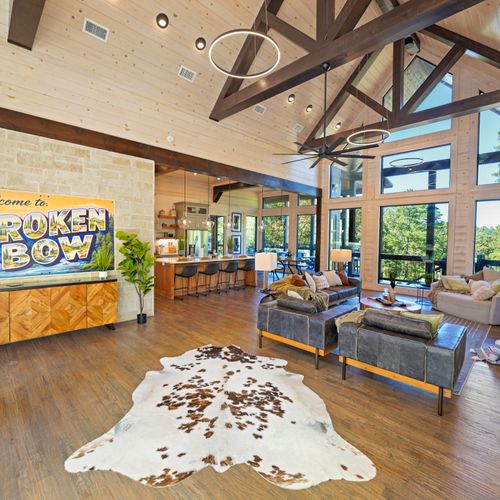 Step inside and let the soaring high ceilings, walls of windows, and rich natural textures wrap you in comfort.