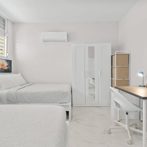Sink into this inviting, well-lit, and super comfortable bed.