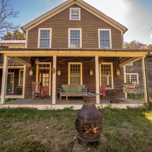 Beautiful front porch is perfect for enjoying the fall foliage
