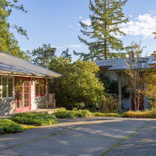 Parking area inside the gate for two cars.  There are two other parking areas just outside the gate by the garage.
