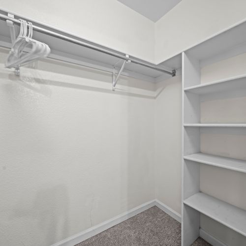 Open closet with shelving for organized stays