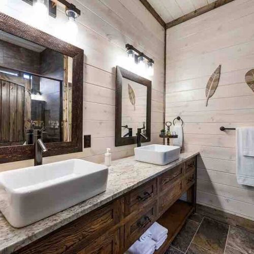 The private master bathroom has a double vanity and walk-in shower!