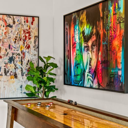 The space blends luxury finishes with a warm, livable feel.