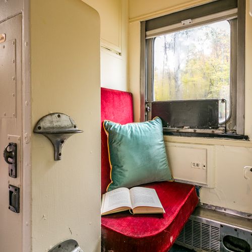 The Porter's Seat makes the perfect little nook to snuggle up with a book after you've boarded the train.