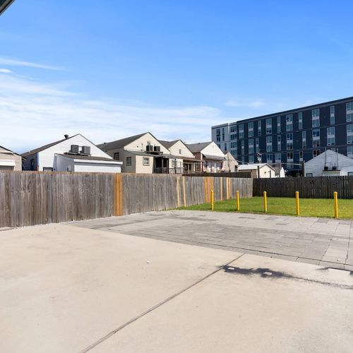 Large parking lot behind the building — easy in, easy out for the whole group.