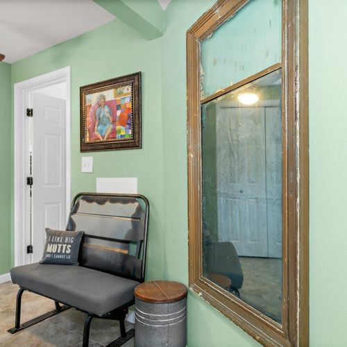 Nook area outside the Master Bedroom/Bath with a door that takes you into the fenced area into the sunny courtyard.