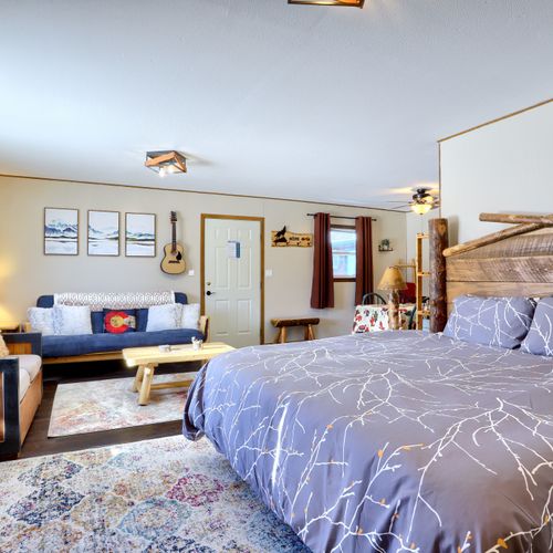 The studio style cabin is cozy and quaint.