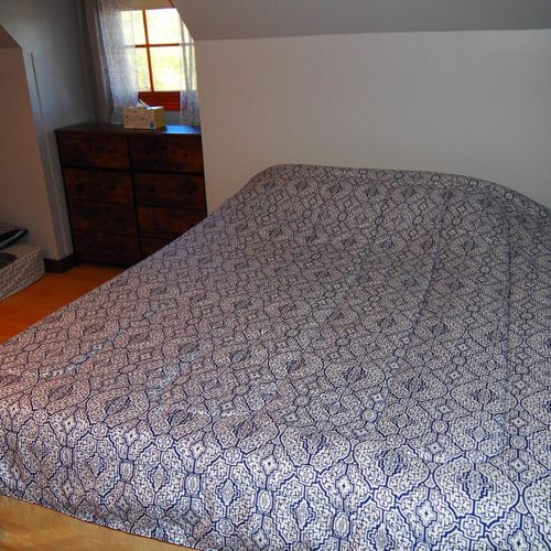 Bedroom #3 (second floor):  includes a queen-size bed, a full-size bed, and a twin-on-full bunk bed. Also has a dresser. Closet, and ceiling fan.