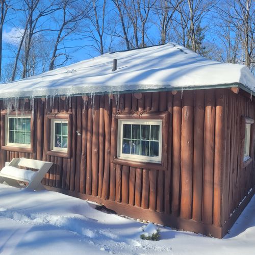 Overall:  the front of the cabin in winter