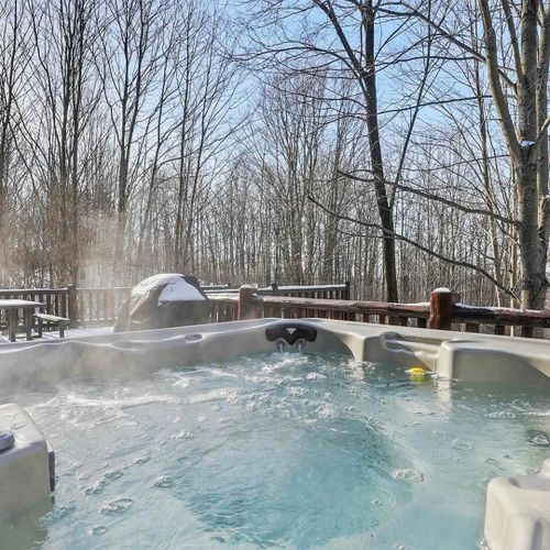 Exterior:  the hot tub in winter.