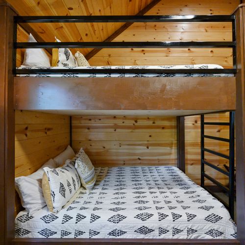 Custom built queen-over-queen bunk beds!