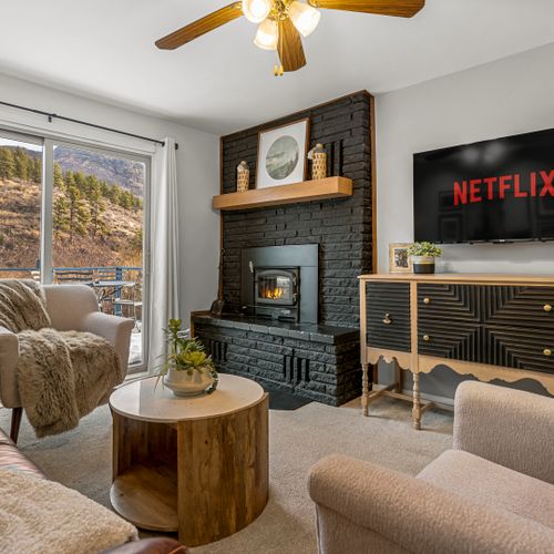 Settle in by the fireplace with your favorite shows or a great book—the perfect way to end a day in the mountains.