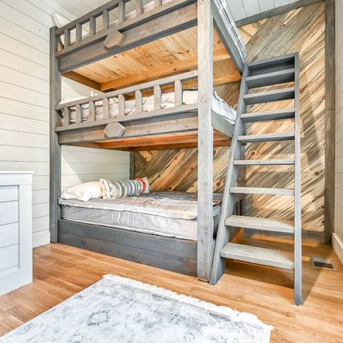 On the ground level is a 3-tier Bunk room with 3 double beds.