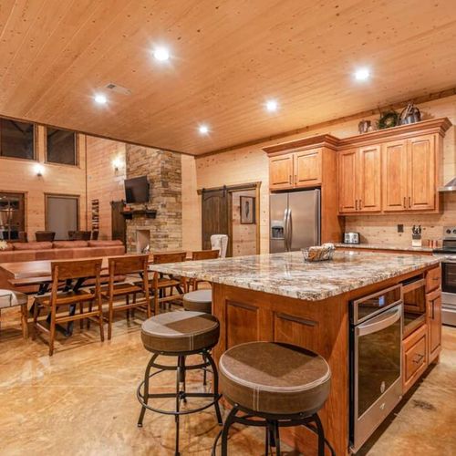 A formal dining area as well as seating at the bar top.