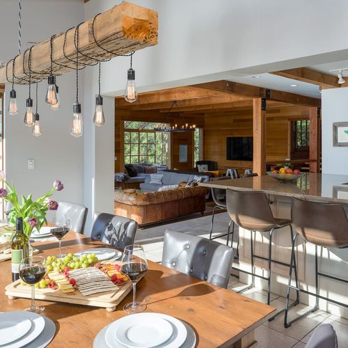 Dining area with  hanging overhead lights