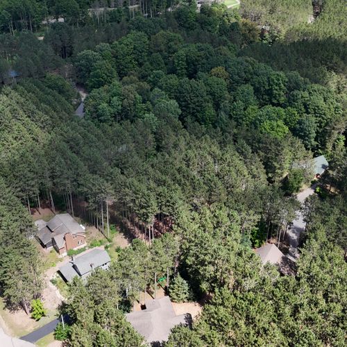 EXTERIOR:  Looking from above the house at Crystal Mountain