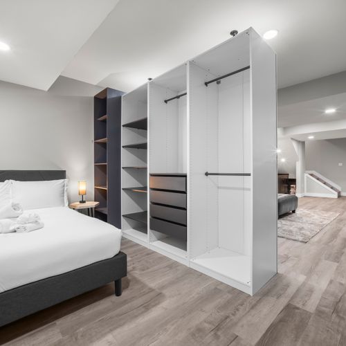 Fresh, spotless bedroom with plenty of storage space