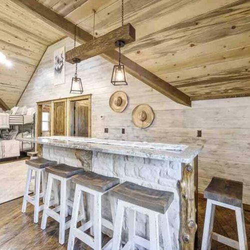 Additional bar-top seating is available in the loft!