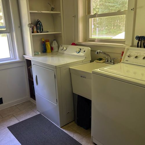 Laundry room:  the cabin has a laundry room with a washer, dryer, and laundry sink.
