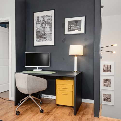Thoughtful office area with monitor and desk, perfect for working from home