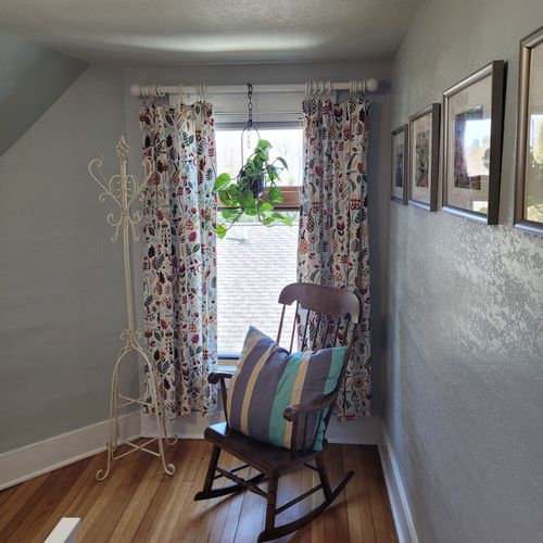 Bedroom #4 (second floor):  this very cute upstairs bedroom features two twin-size beds, a nightstand, lamp, pedestal fan, chair, and a large walk-in closet.