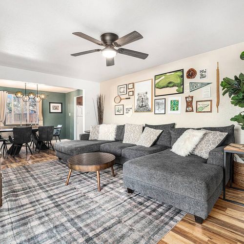- bright and airy layout connects lounging, dining, and kitchen spaces effortlessly
- wall of playful art meets plush seating for the ultimate comfort meets culture vibe
- perfect setup for movie nights, family dinners, or just putting your feet up