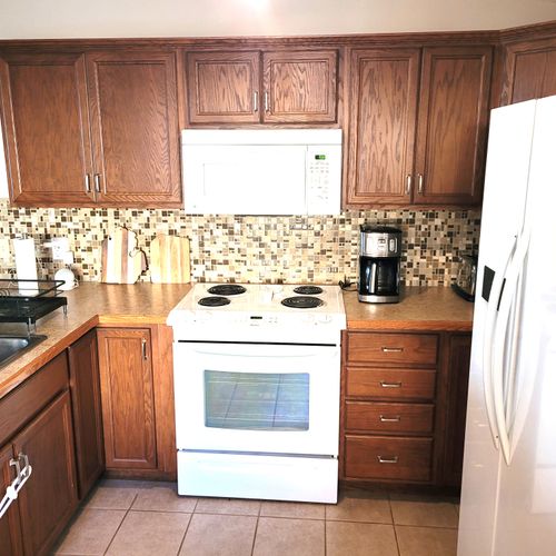 KITCHEN:  The home has a cute and modern kitchen with all appliances, except for a microwave and a dishwasher.
