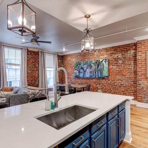 NOLA-inspired artwork adding local character to the living space.