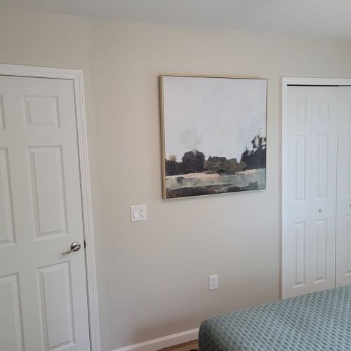 Bedroom #2:  bedroom #2 features a queen-size bed, ceiling fan, dresser, matching nightstands with lamps, and a closet.