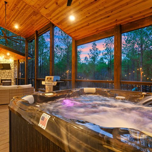 The luxury 8-person hot tub on the covered patio.