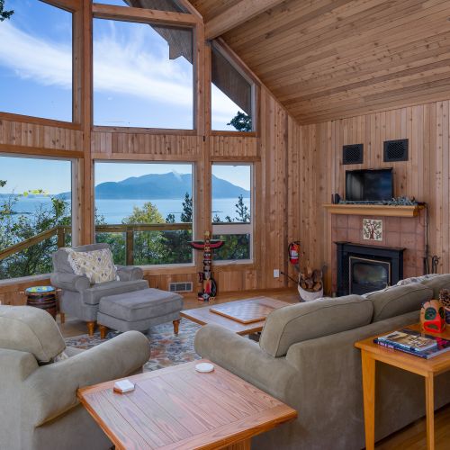 The Great Room with elevated windows that bring the sea and islands inside.