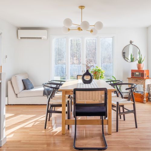 The kitchen and dining area seamlessly flow into each other, creating the perfect space for hosting gatherings.