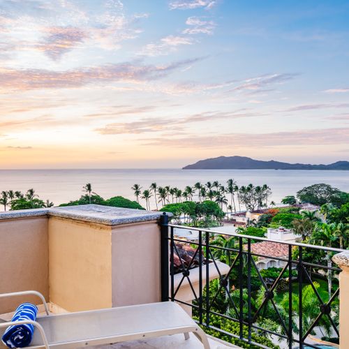 Watch the sunset over Tamarindo Bay
